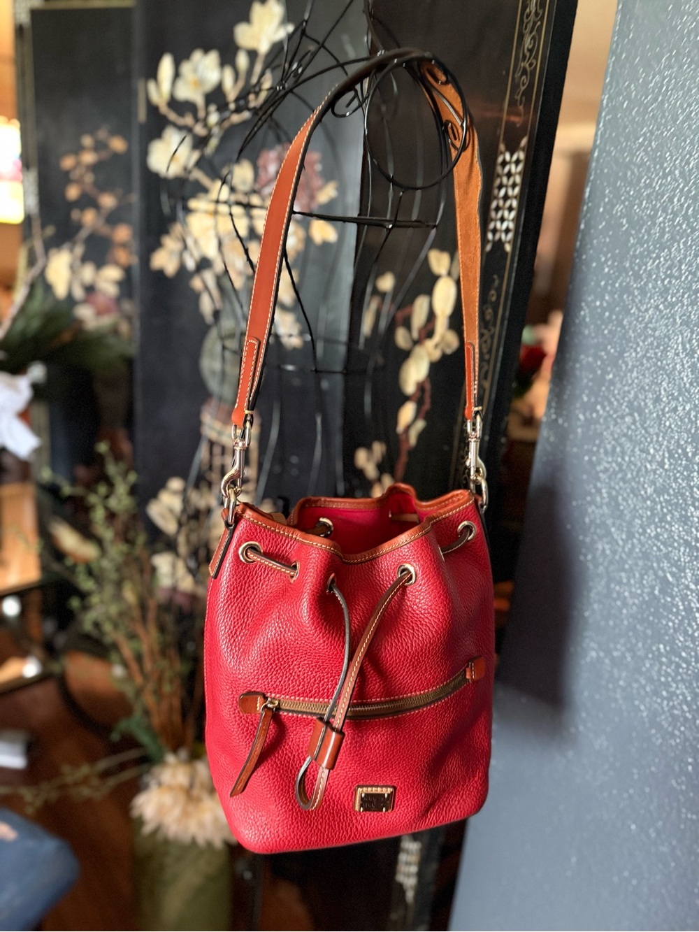 Dooney & Bourke red and British tan pebble bucket